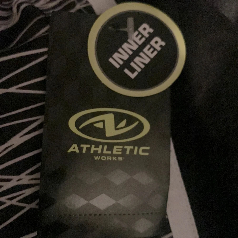 New athletic shorts, new, size L (12-14).